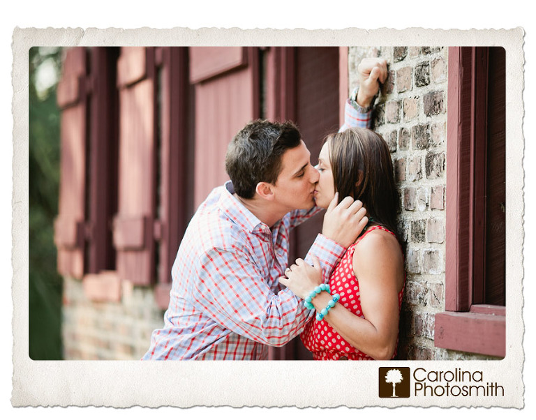 Soaking up a Charleston spring with sweet kiss during a beautiful outdoor engagement session.