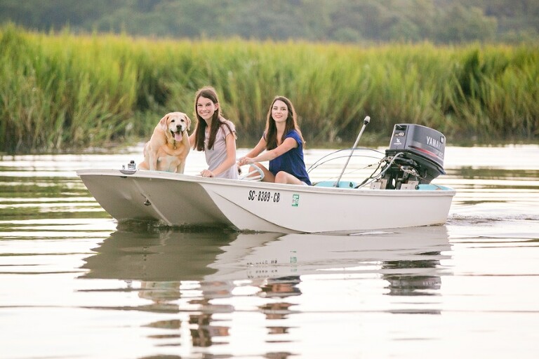 Faithful furry companion on a boat. National Dog Day!