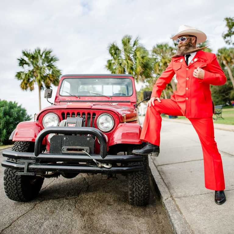 Charleston Beer Can Professor poses with his awesome beard and two 1982 Jeeps