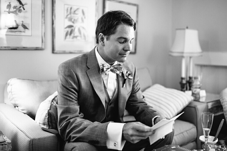 Glassy-eyed groom reads note from almost wife River House Charleston