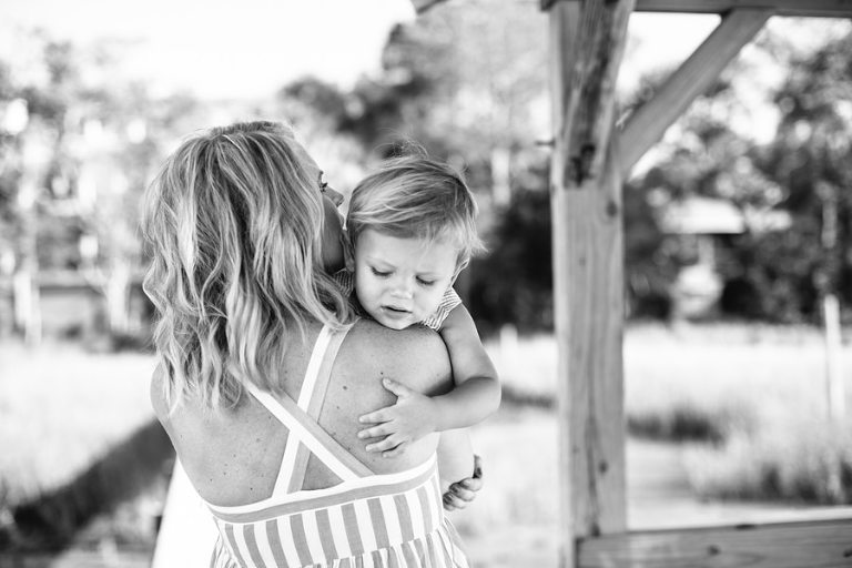 Henry hugs mama on Goat Island dock